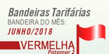 imagem de uma bandeira vermelha com legenda bandeiras tarifárias bandeira do mês junho 2018 vermelha
